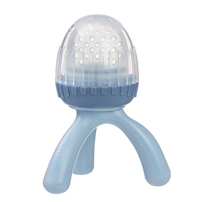 Eclectic B.Box blue silicone fresh food feeder with a protective cap and unique tripod base for self-feeding.