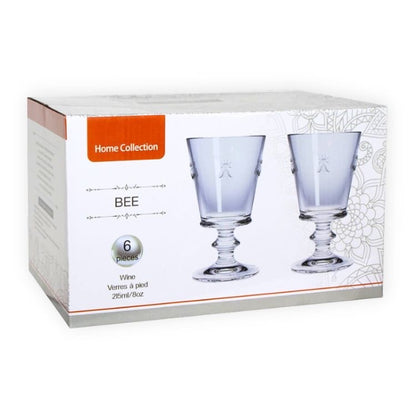 Eclectic set of six clear glass wine tumblers featuring an embossed bee motif in original retail packaging