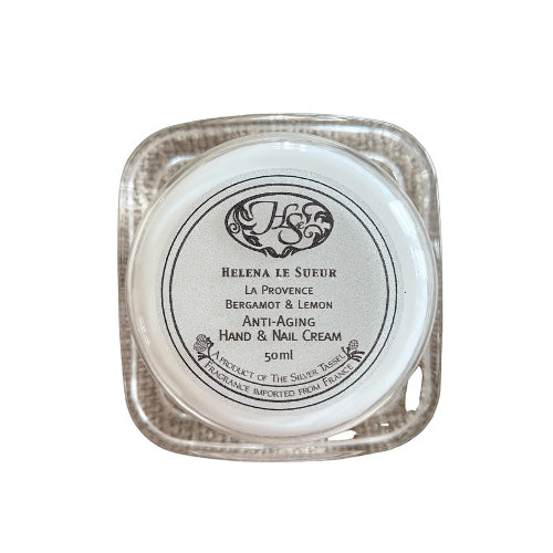 Eclectic Bergamot & Lemon hand and nail cream in a square double-walled Perspex jar with a silver finish.