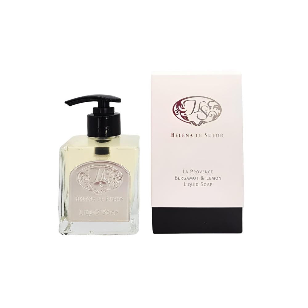 Eclectic Bergamot and Lemon liquid soap in a square glass bottle with a pewter label next to its gift box.