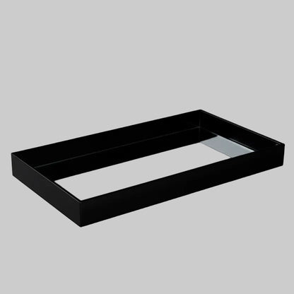 Eclectic black acrylic rectangular display tray with a polished mirrored base for elegant home decor styling.