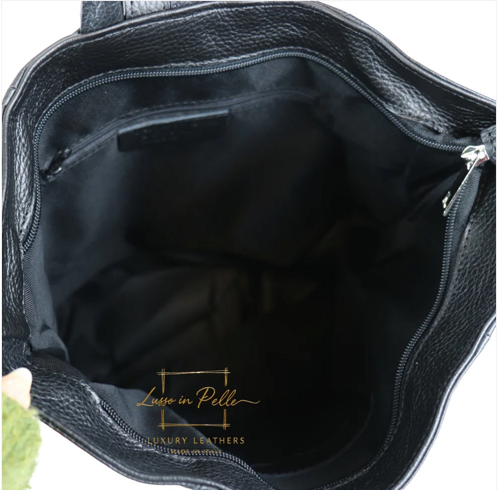 Eclectic black Italian pebbled leather backpack interior with zip and slip pockets and secure top zip closure