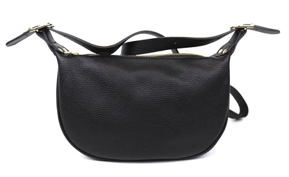 Eclectic black grained leather half moon sling bag with gold hardware and adjustable strap on a white background