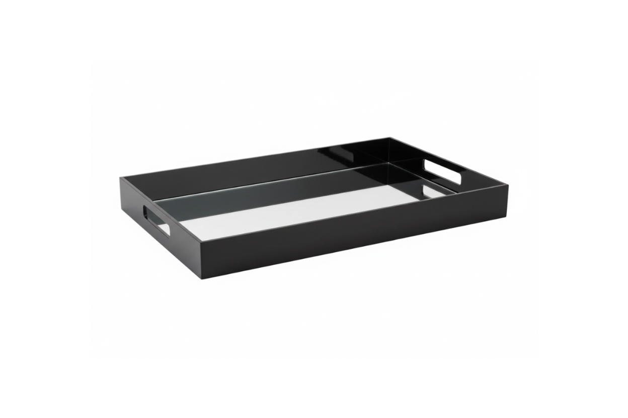 Eclectic black acrylic serving tray with a reflective mirrored base and integrated handles for modern home decor.