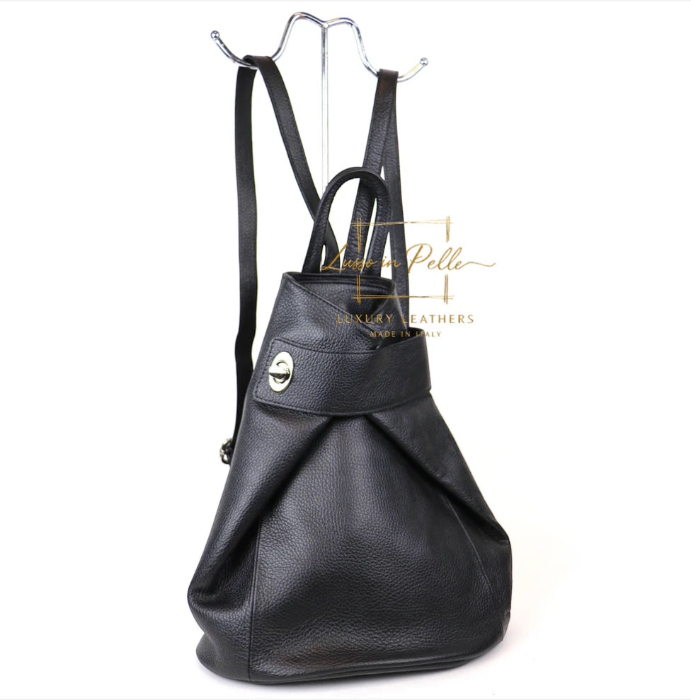 Eclectic black Italian pebbled leather backpack with a fold-over front and secure twist-lock closure.