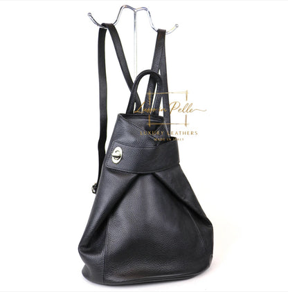Eclectic black Italian pebbled leather backpack with a fold-over front and secure twist-lock closure.