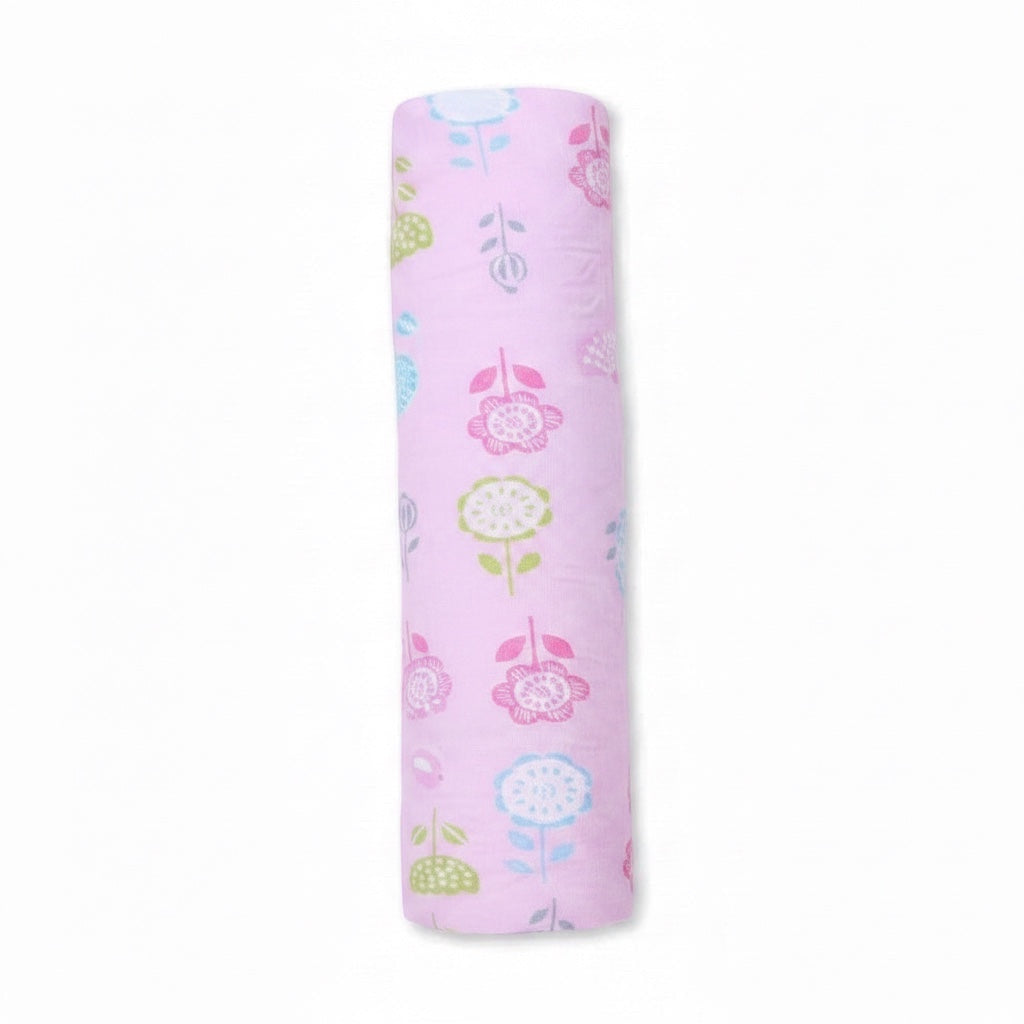 Eclectic Blush Blossom cotton flannel swaddle blanket in soft pink with a delicate pastel floral print.