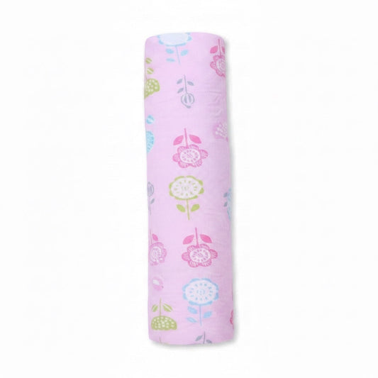 Eclectic Blush Blossom cotton flannel swaddle blanket in soft pink with a delicate pastel floral print.