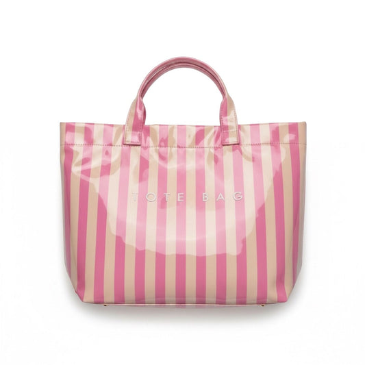 Eclectic blush and neutral striped PVC carry tote bag with fixed shoulder straps and magnetic closure.