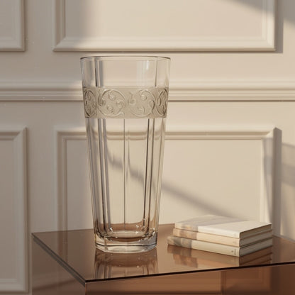 Eclectic Bohemia Aurora clear lead-free crystal vase with ornate decorative band on a glass table.