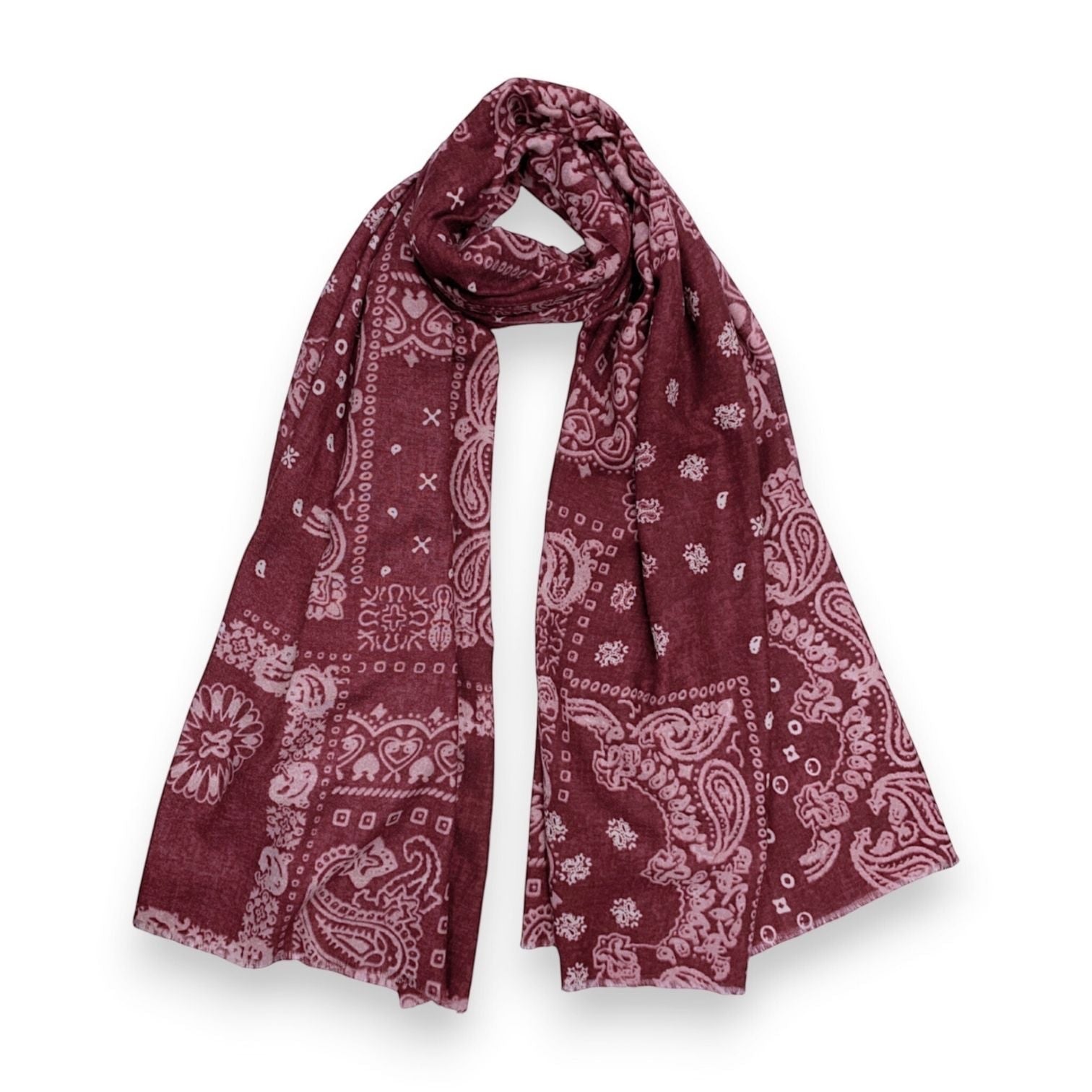 Eclectic burgundy wool blend scarf with a cream bandana paisley print, draped in a soft, lightweight style.