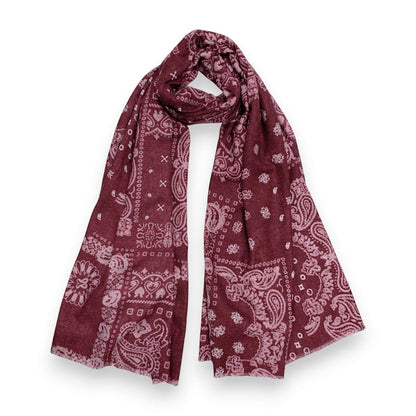 Eclectic burgundy wool blend scarf with a cream bandana paisley print, draped in a soft, lightweight style.