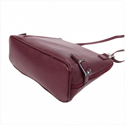 Eclectic Capri burgundy grained leather crossbody bag with silver side buckle detail and adjustable strap