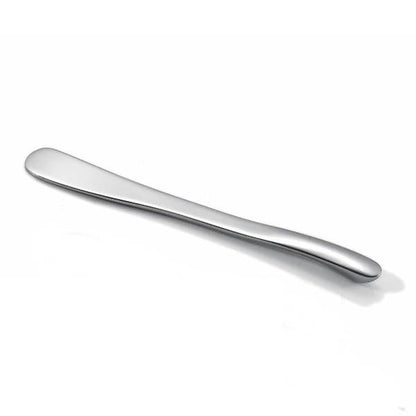 Eclectic Capri stainless steel pate and butter knife with a sleek, sculptural, and minimalist design.