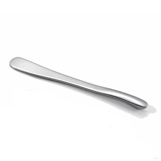 Eclectic Capri stainless steel pate and butter knife with a sleek, sculptural, and minimalist design.