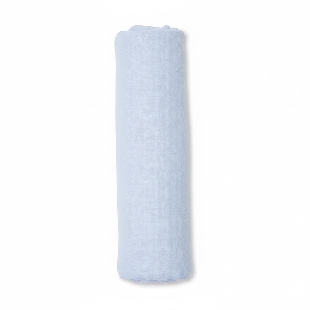 Eclectic Carter’s Cloudy Breeze blue cotton muslin swaddle blanket rolled up on a white background