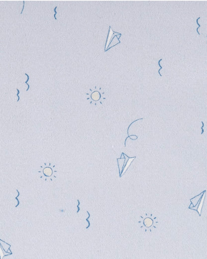 Eclectic Carter’s cotton muslin swaddle in soft blue with a dreamy flight paper plane and sun print pattern