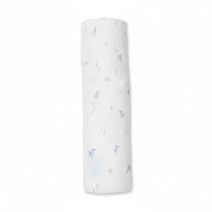 Eclectic Carter’s cotton muslin swaddle in white with blue paper plane and cloud print, rolled for display.