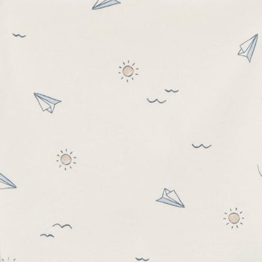 Eclectic Carter’s ivory cotton burp cloth with blue paper plane and sun print pattern