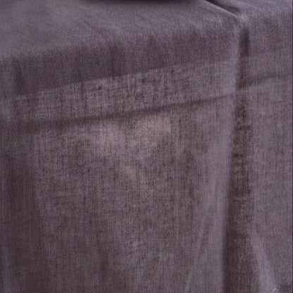 Eclectic charcoal grey 100% preshrunk linen table runner with stitched edges and a soft, natural fabric texture.