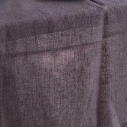 Eclectic charcoal grey 100% preshrunk linen table runner with stitched edges and a soft, natural fabric texture.