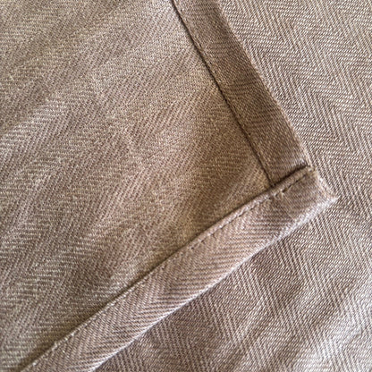 Eclectic Charvet Editions chocolate brown 100% linen tablecloth with a detailed herringbone weave and stitched hem