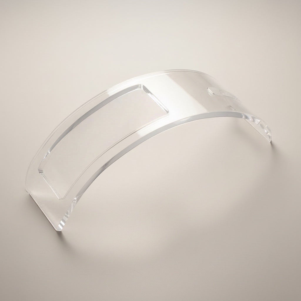 Eclectic clear acrylic wine holder with a curved, minimalist design for a floating bottle effect.
