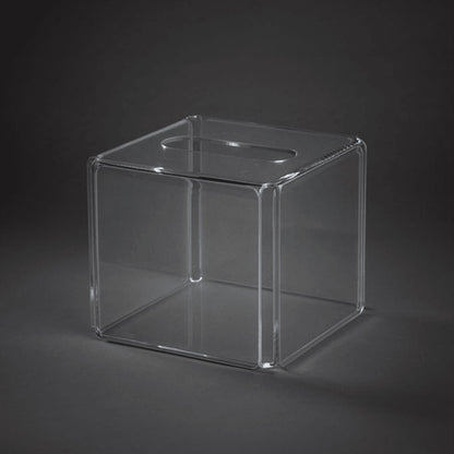 Eclectic clear square acrylic tissue box cover with a minimalist, modern design for vanity or bathroom decor.