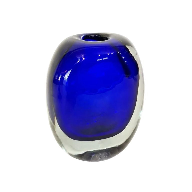 Eclectic cobalt blue art glass vase with a rounded sculptural silhouette and clear glass casing.