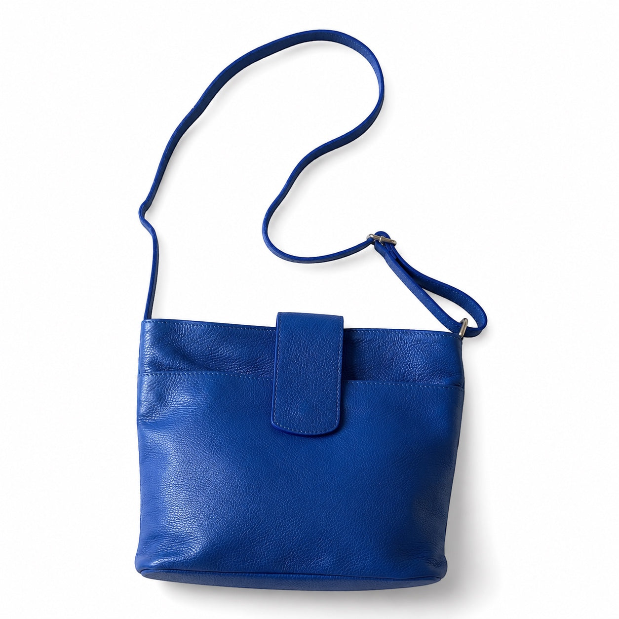 Eclectic Como royal blue pebbled leather crossbody bag with adjustable strap and magnetic flap closure.