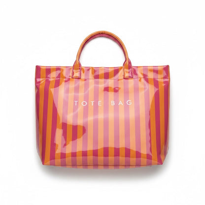 Eclectic coral and pink striped PVC tote bag with fixed shoulder straps and magnetic closure.
