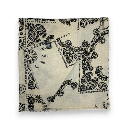 Eclectic cream wool blend scarf featuring a black oversized bandana paisley print with frayed edges