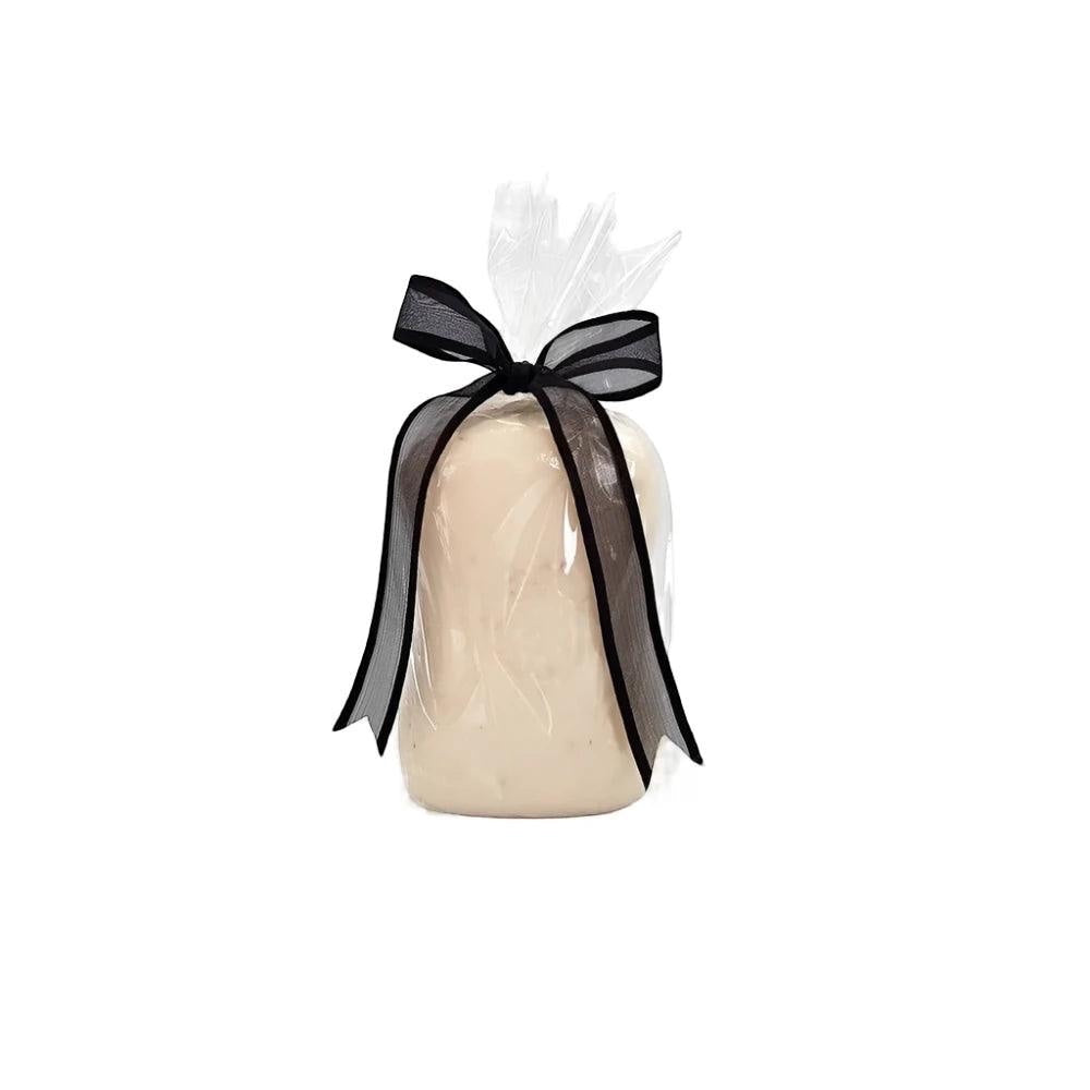 Eclectic Crown Embossed Edwardian Soap wrapped in clear cellophane with a decorative black ribbon.