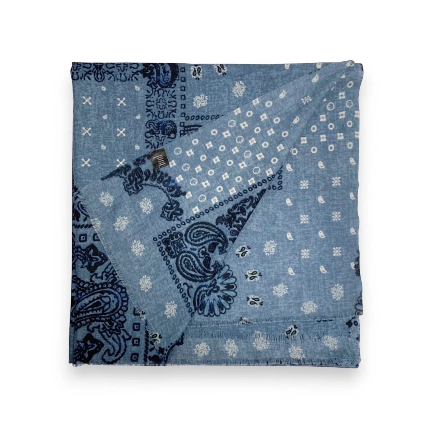 Eclectic denim blue wool blend scarf with a navy bandana paisley print and frayed edges.