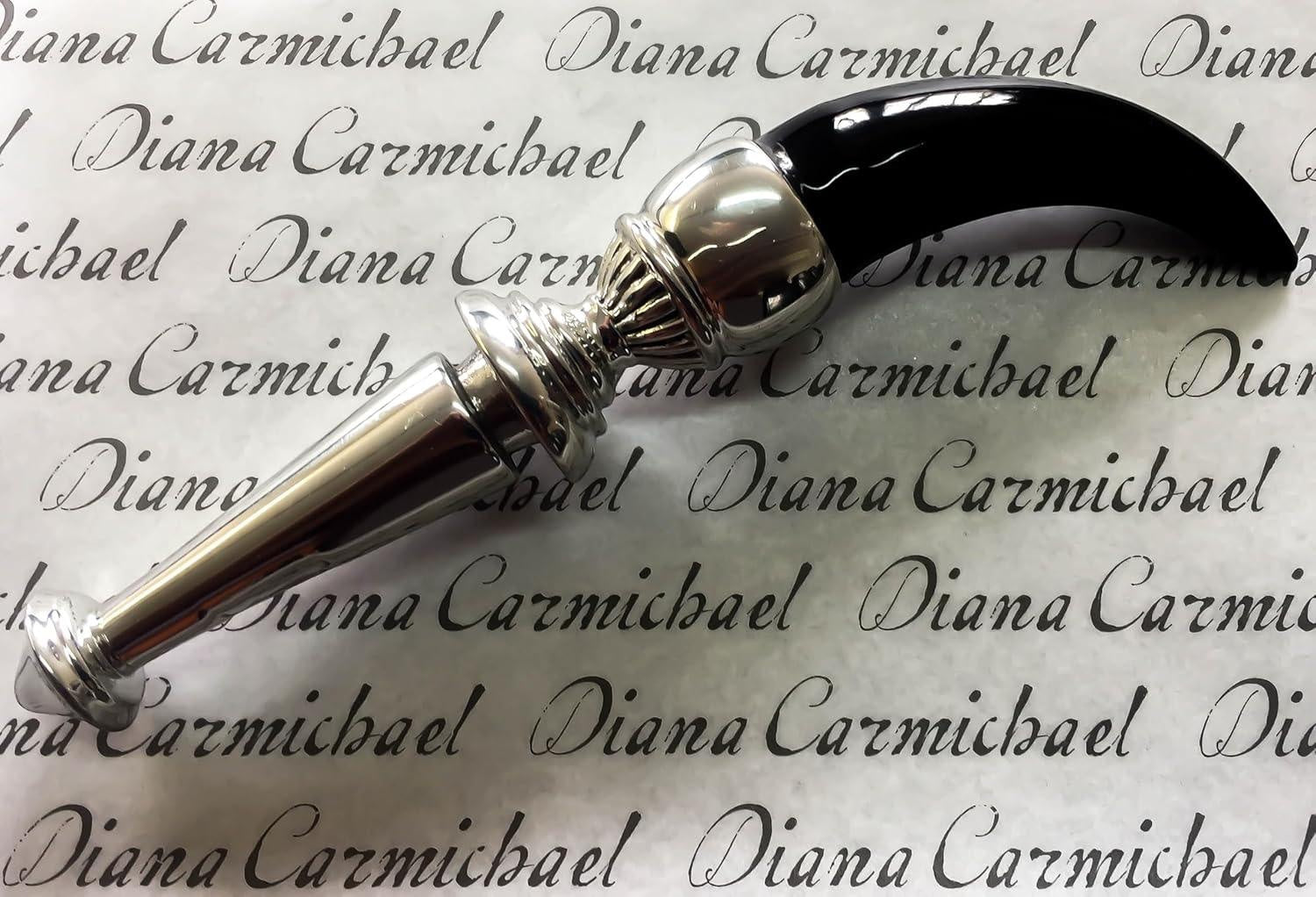 Eclectic Diana Carmichael Impondo Zulu bottle stopper featuring a polished ebony resin horn handle and silver pewter base.