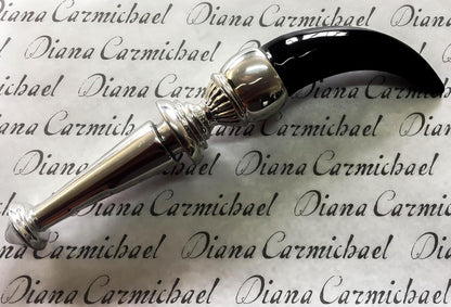 Eclectic Diana Carmichael Impondo Zulu bottle stopper featuring a polished ebony resin horn handle and silver pewter base.