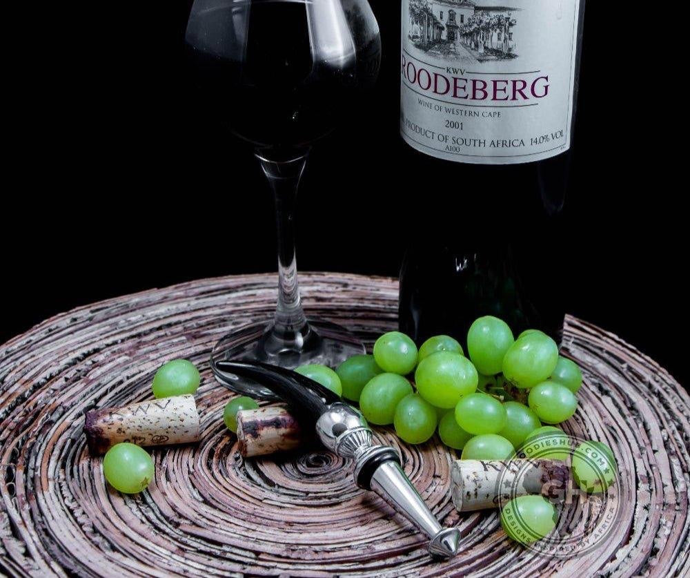 Eclectic Diana Carmichael Impondo Zulu bottle stopper with ebony resin horn handle and silver pewter detailing.