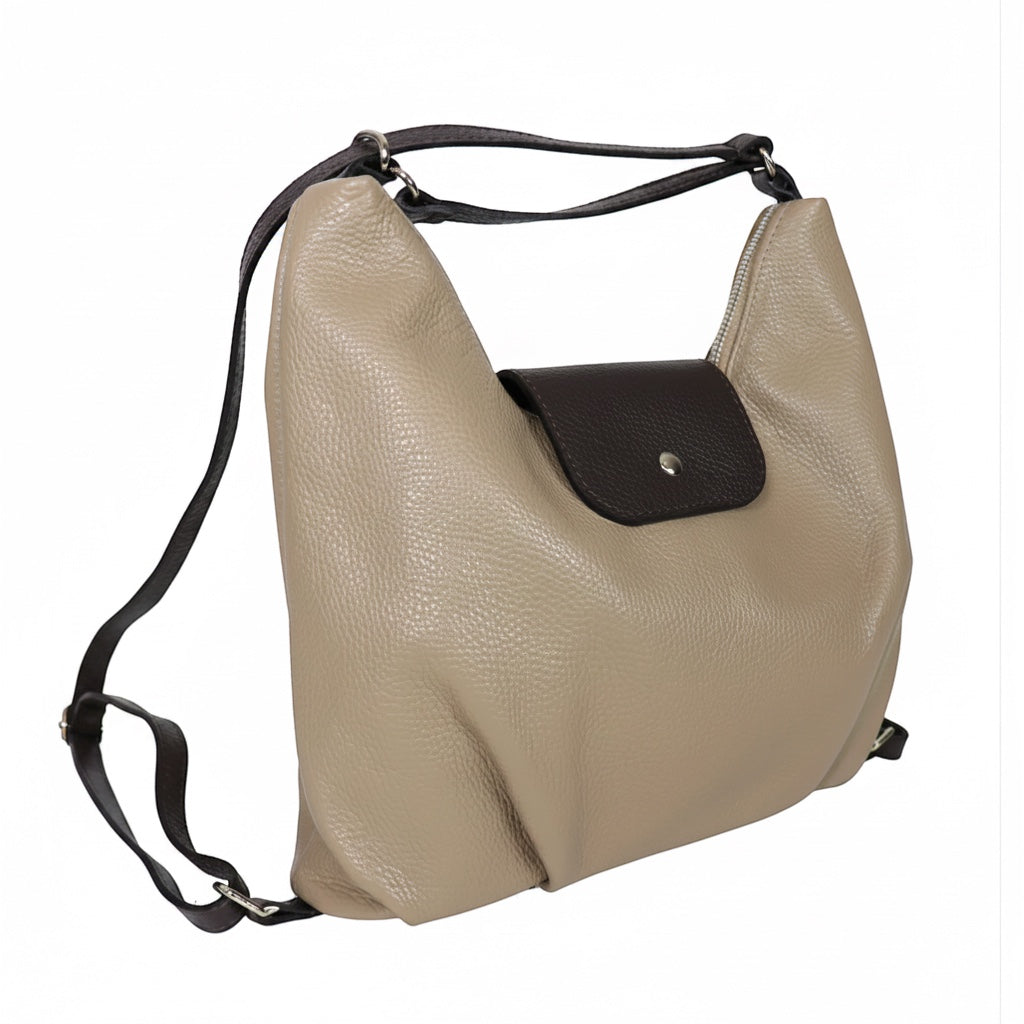 Eclectic Donatello Duo taupe grain leather convertible bag with black contrast flap and adjustable shoulder straps.
