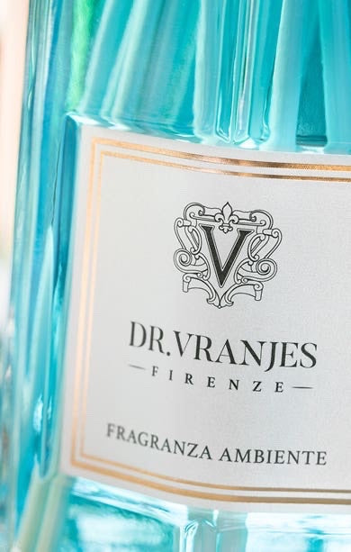 Eclectic Dr Vranjes Acqua diffuser refill bottle in vibrant blue glass with elegant white and gold label