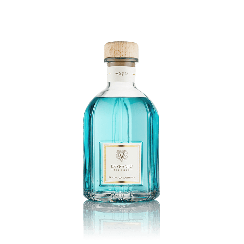 Eclectic Dr Vranjes Acqua reed diffuser in a clear glass bottle with blue fragrance liquid and a wooden cap.