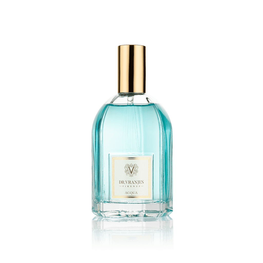 Eclectic Dr. Vranjes Acqua room spray in a clear glass bottle with a gold cap and light blue fragrance liquid