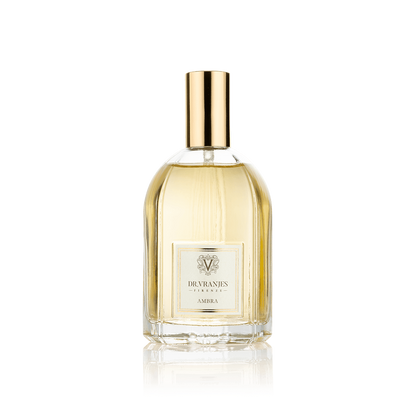 Eclectic Dr. Vranjes Ambra room spray in a 100ml glass bottle with a gold cap against a black background.