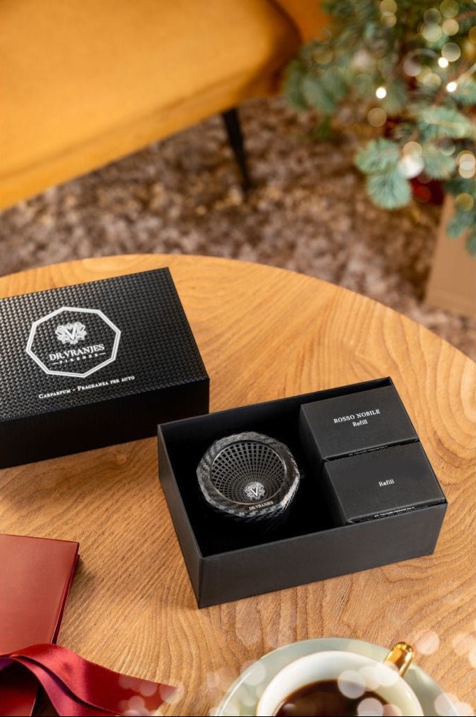 Eclectic Dr Vranjes carbon car diffuser gift set with Rosso Nobile and Oud Nobile refills in a black presentation box.