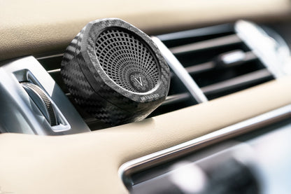 Eclectic Dr Vranjes carbon fibre car air vent diffuser with octagonal architectural design in a luxury car interior