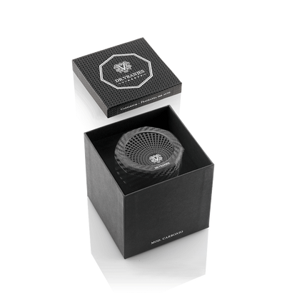Eclectic Dr Vranjes carbon fibre car fragrance diffuser in an elegant black presentation box with octagonal branding.
