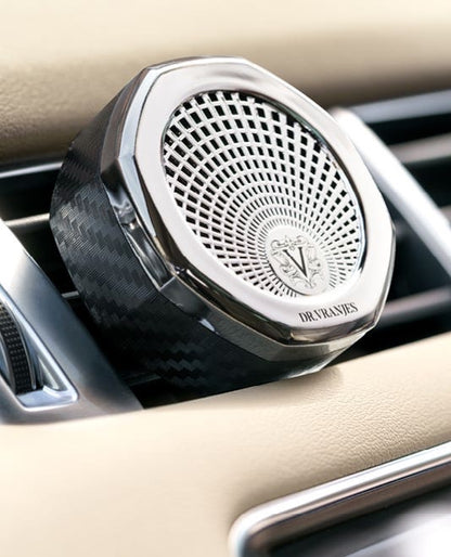 Eclectic Dr Vranjes chrome car air vent diffuser with octagonal design and adjustable fragrance intensity lever