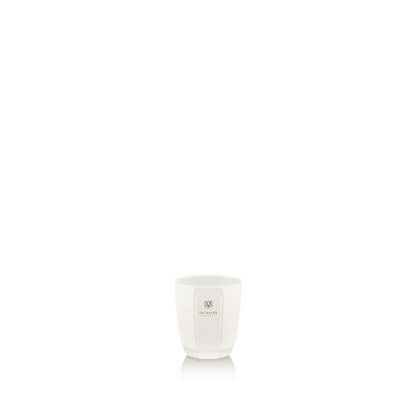 Eclectic Dr. Vranjes Ginger Lime scented candle in a luxurious pearl-coloured glass vase on a black background.