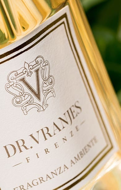 Close-up of the elegant glass bottle label for Eclectic Dr Vranjes Ginger Lime reed diffuser