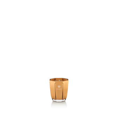 Eclectic Dr. Vranjes Oud Nobile scented candle in a luxurious gold-coloured glass vase on a black background.