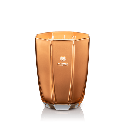 Eclectic Dr. Vranjes Oud Nobile scented candle in a luxurious gold-coloured glass vase against a black background.